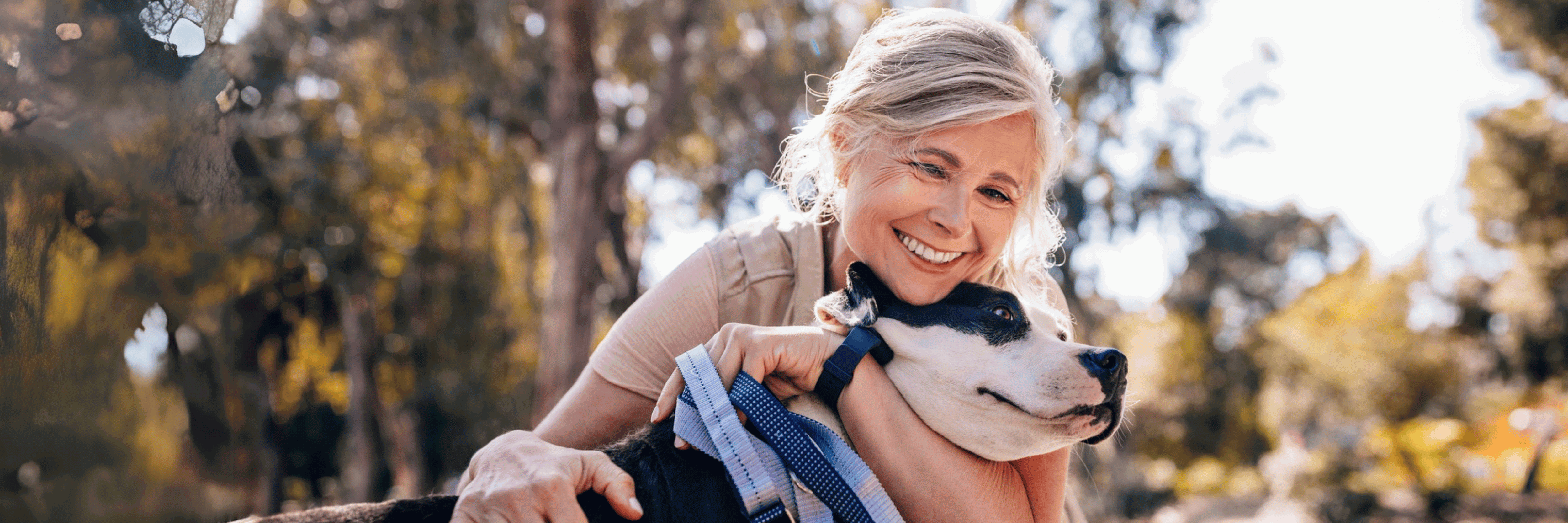 woman hugging her dog