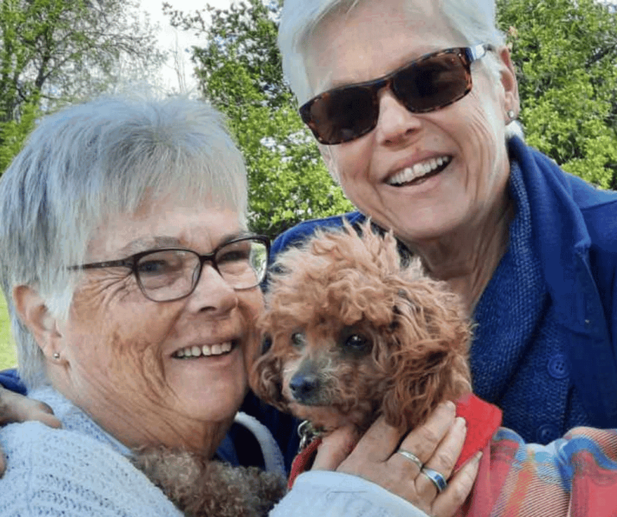 Image of Donna with her sister Judy and dog Yazi